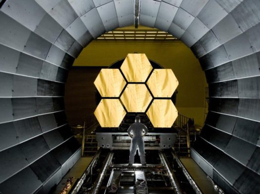 James Webb Space Telescope mirror being inspected at Goddard Space Flight Center, as it nears completion.  The powerful, sophisticated and long-awaited telescope is scheduled to launch in 2018.