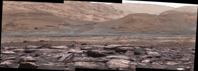 The foreground of this scene from the Mastcam on NASA's Curiosity Mars rover shows purple-hued rocks near the rover's late-2016 location. The middle distance includes future destinations for the rover. Variations in color of the rocks hint at the diversity of their composition on lower Mount Sharp. Credits: NASA/JPL-Caltech/MSSS